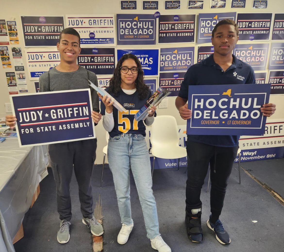 NCYD members holding campaign signs