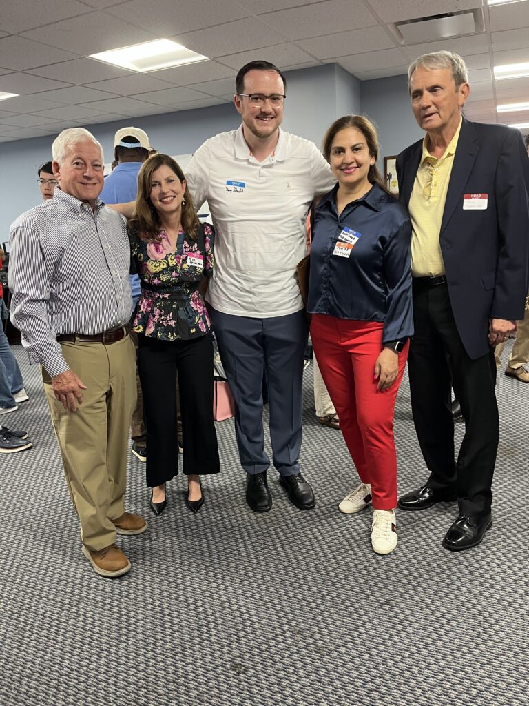 Justin Roache with elected officials